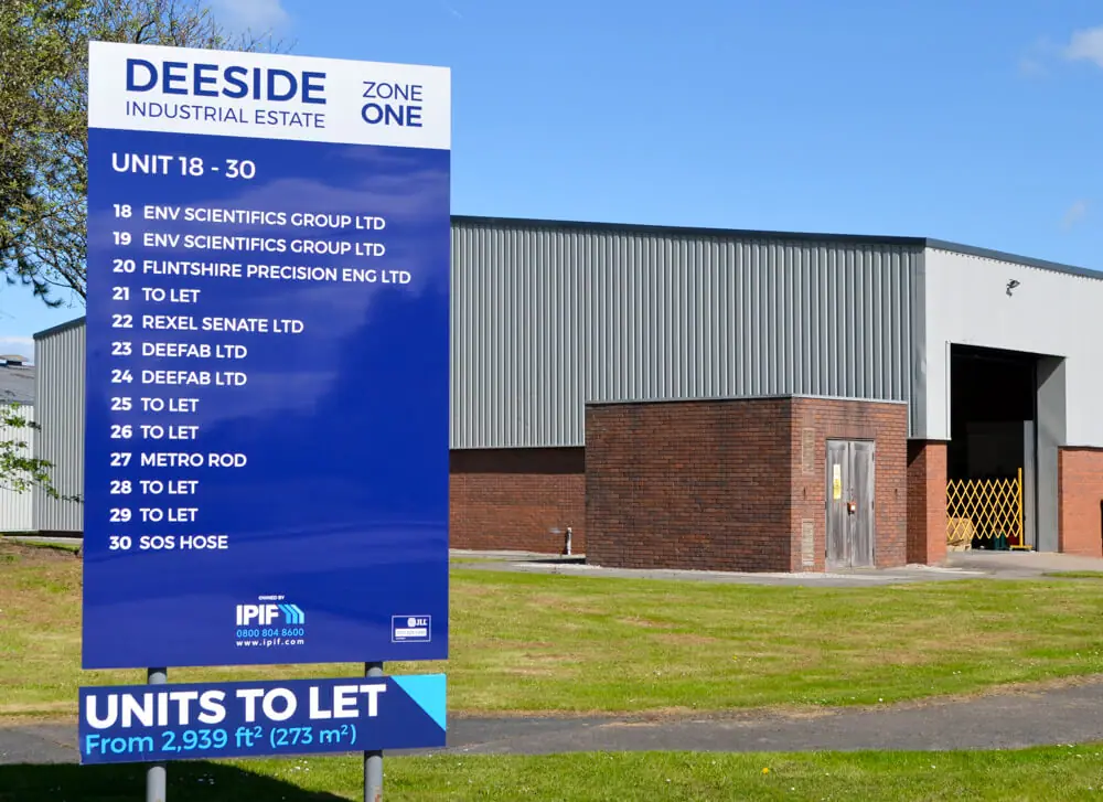 Deeside Industrial Estate Zone One directory board with 'units to let' panel