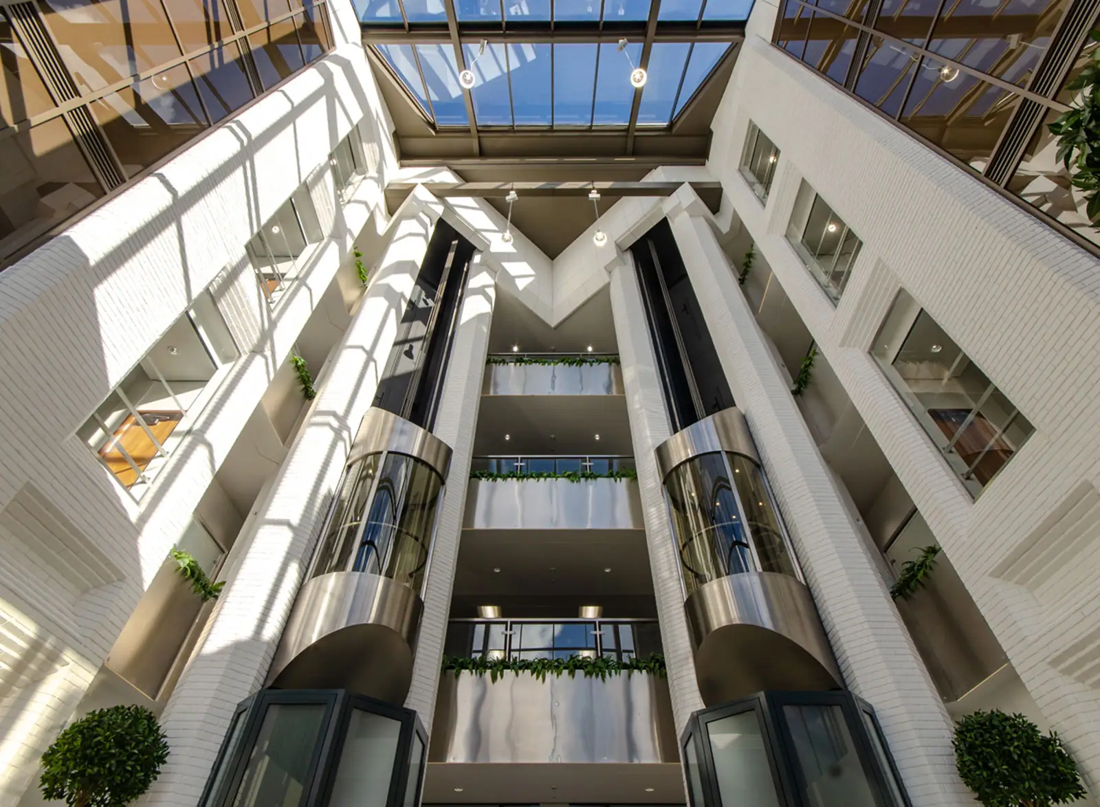 Looking up through the Galleria atrium with its glass lifts