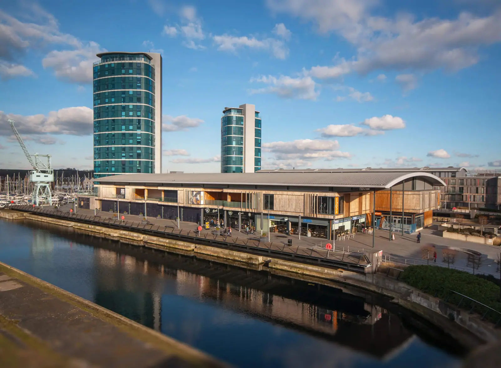 Elevated view of a waterside retail building