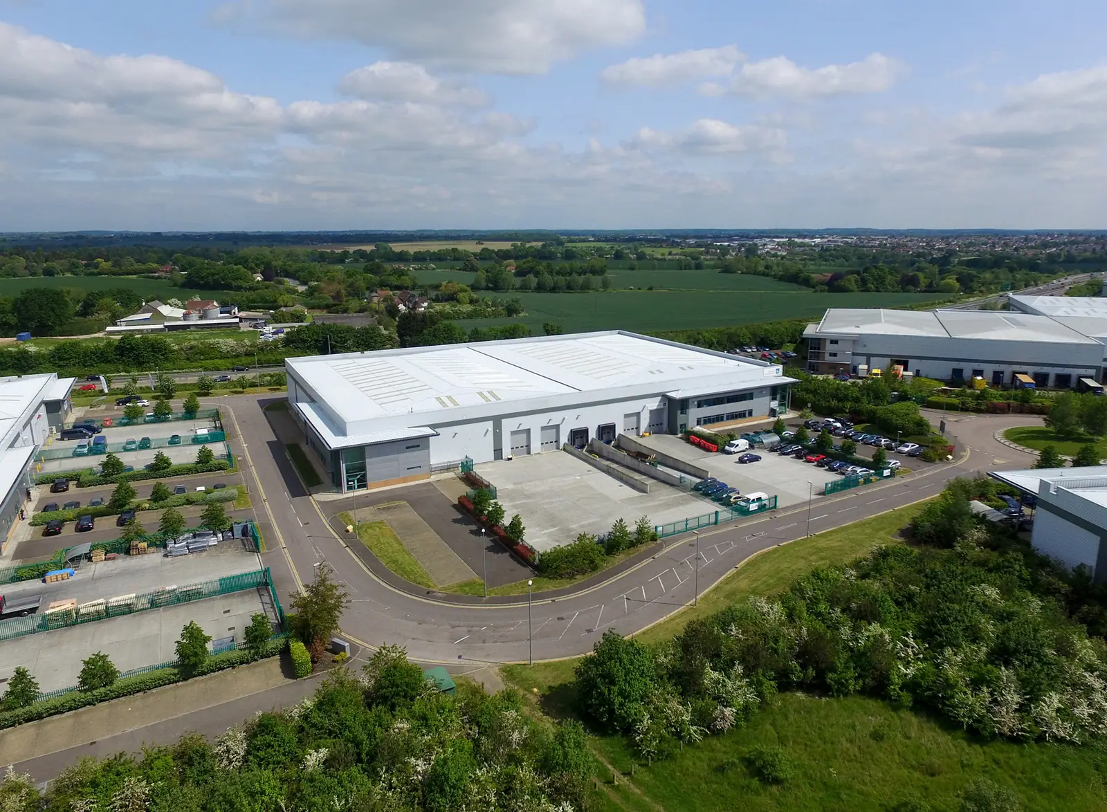 Drone view of a new warehouse in its landscape