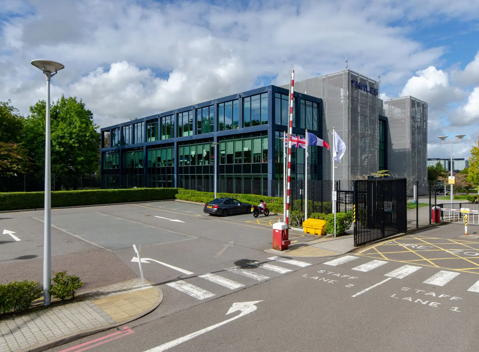 Glass office building and entrance plaza