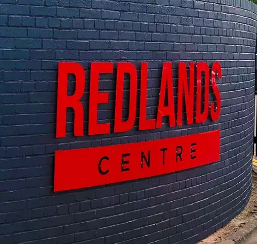 Redlands Centre red built-up lettering