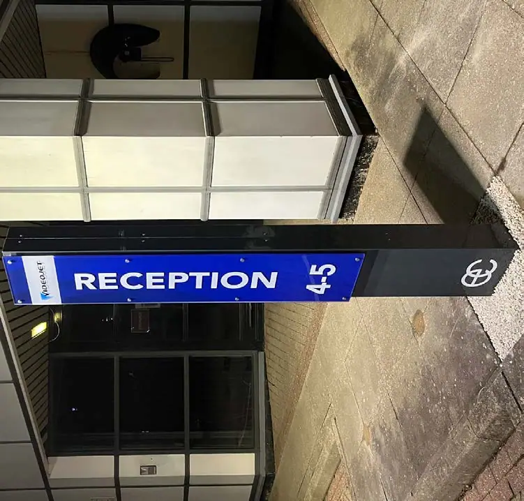 Reception directional sign for unit 45
