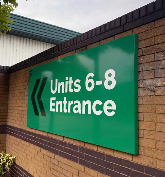 Green 'Units 6–8 entrance' wayfinder