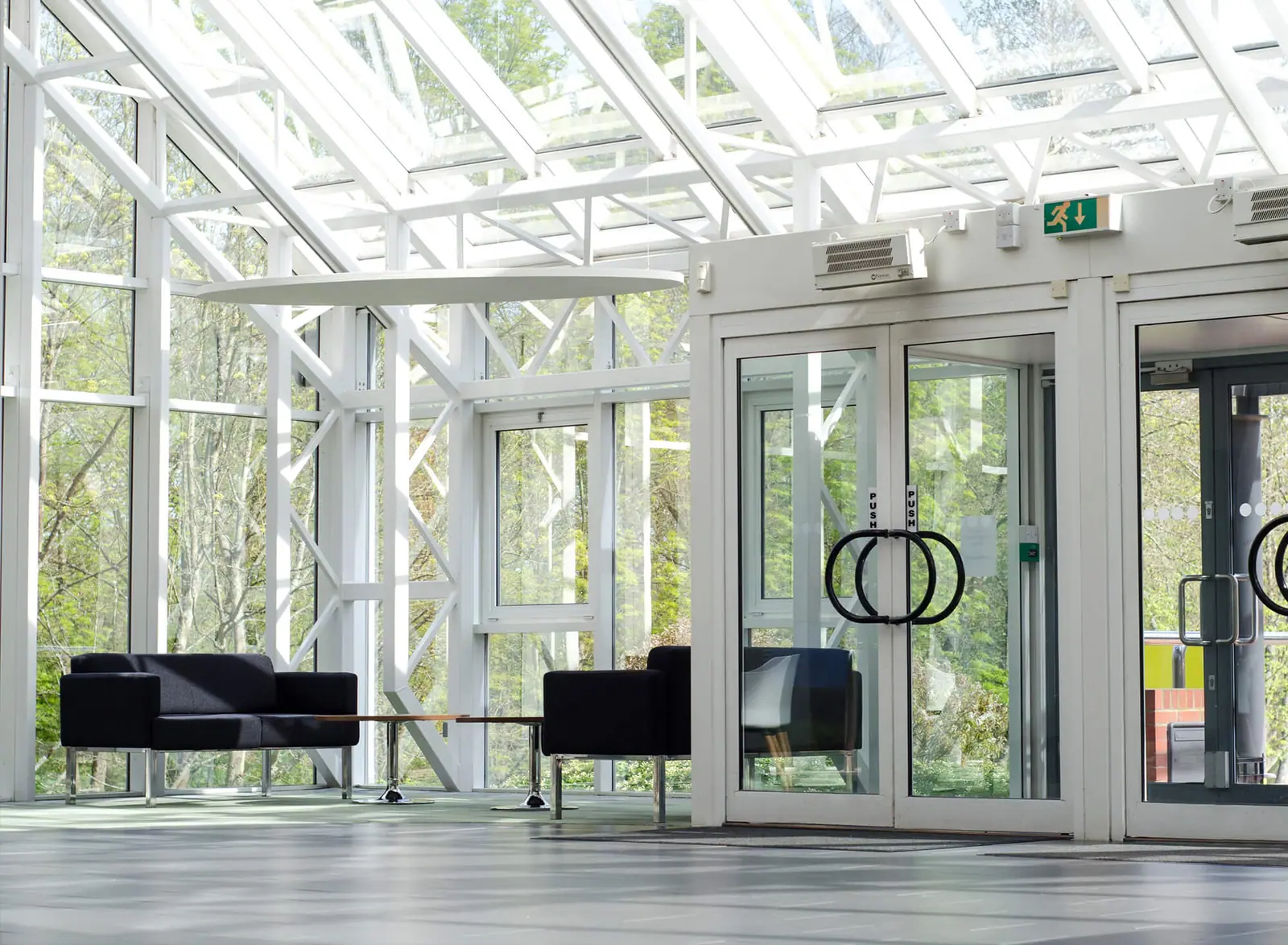 Glass entrance lobby with lounge seating