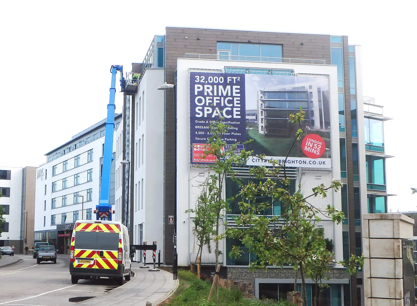 City View office building next to Brighton station with its 'prime office space' banner