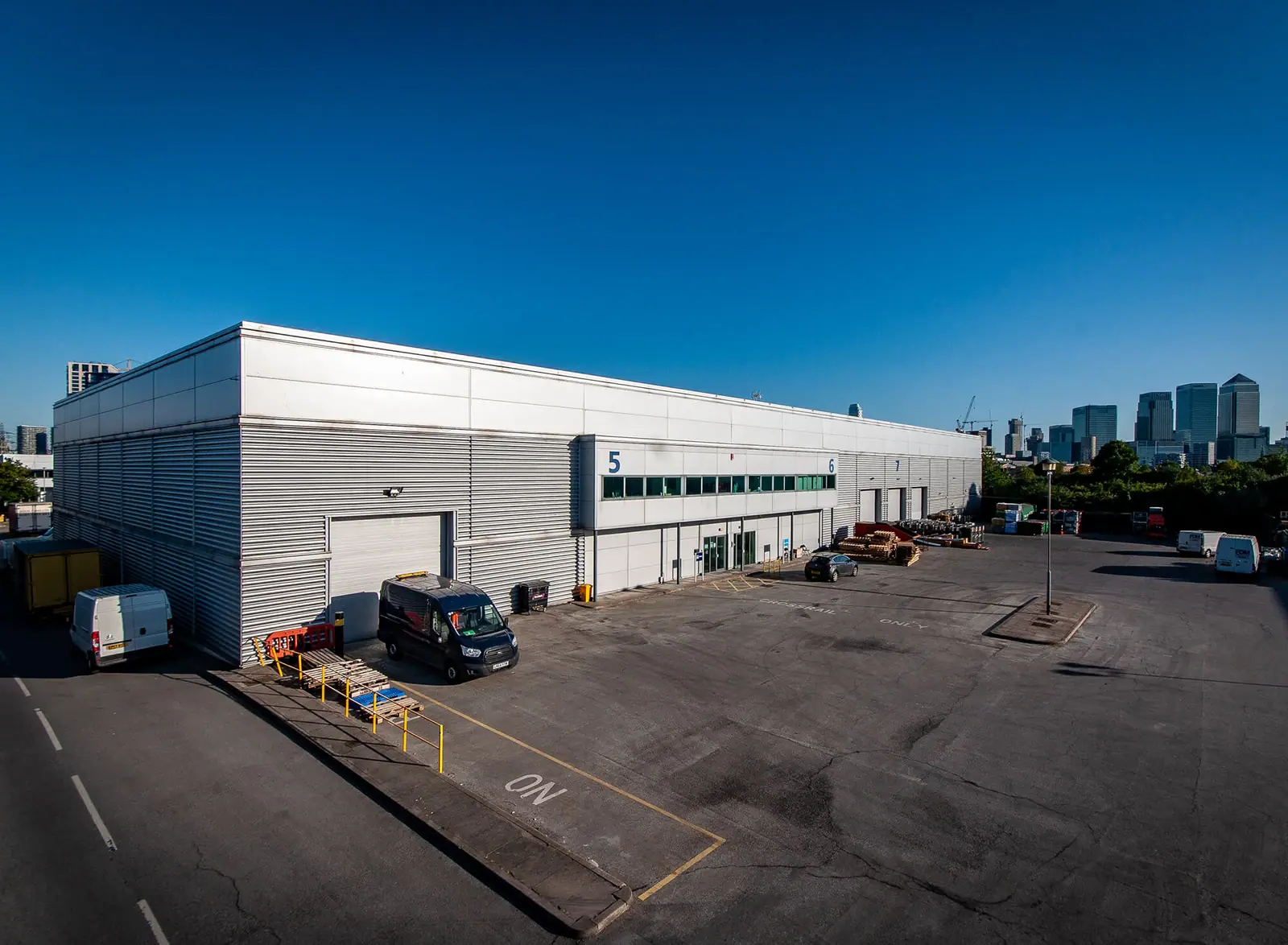 Electra warehouse unit with the City skyline behind