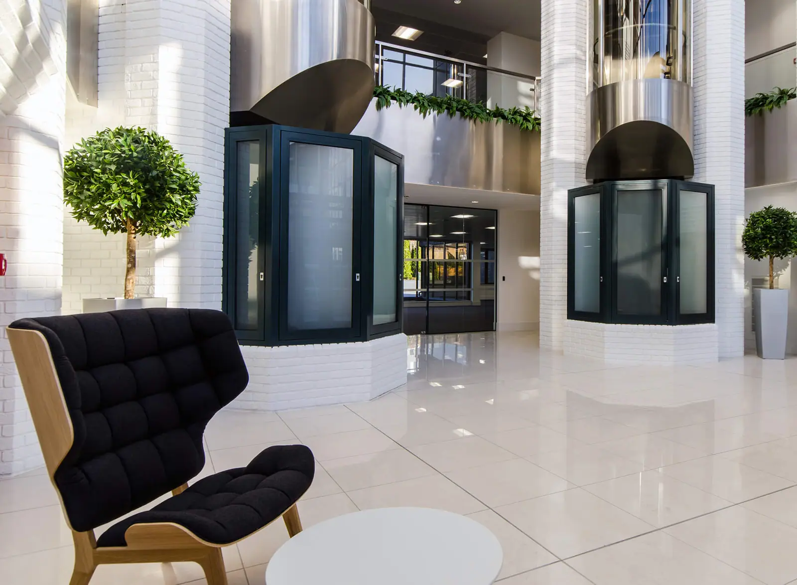 Galleria entrance lobby with a lounge chair