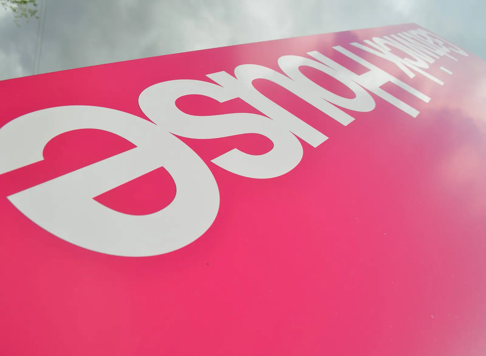 Close-up of the magenta Gatwick House sign