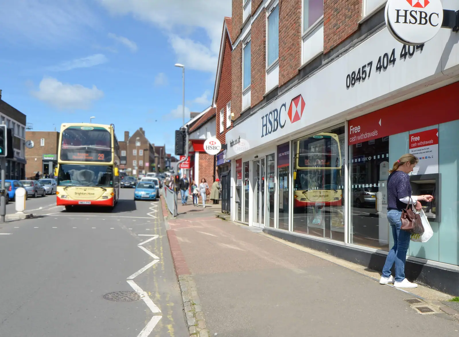 Uckfield High Street with a bus passing the HSBC branch