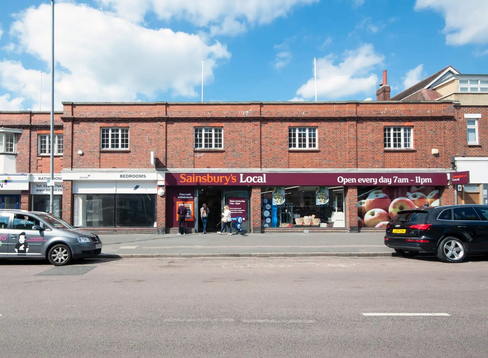 Portland Road shopfronts including Sainsbury's Local