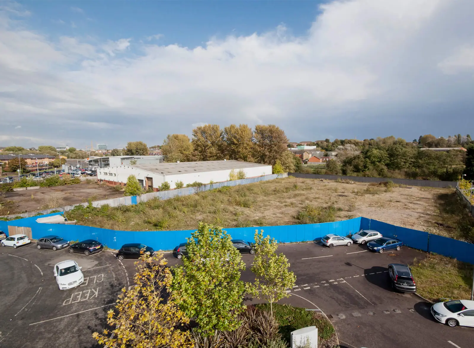 The site from above with blue hoarding