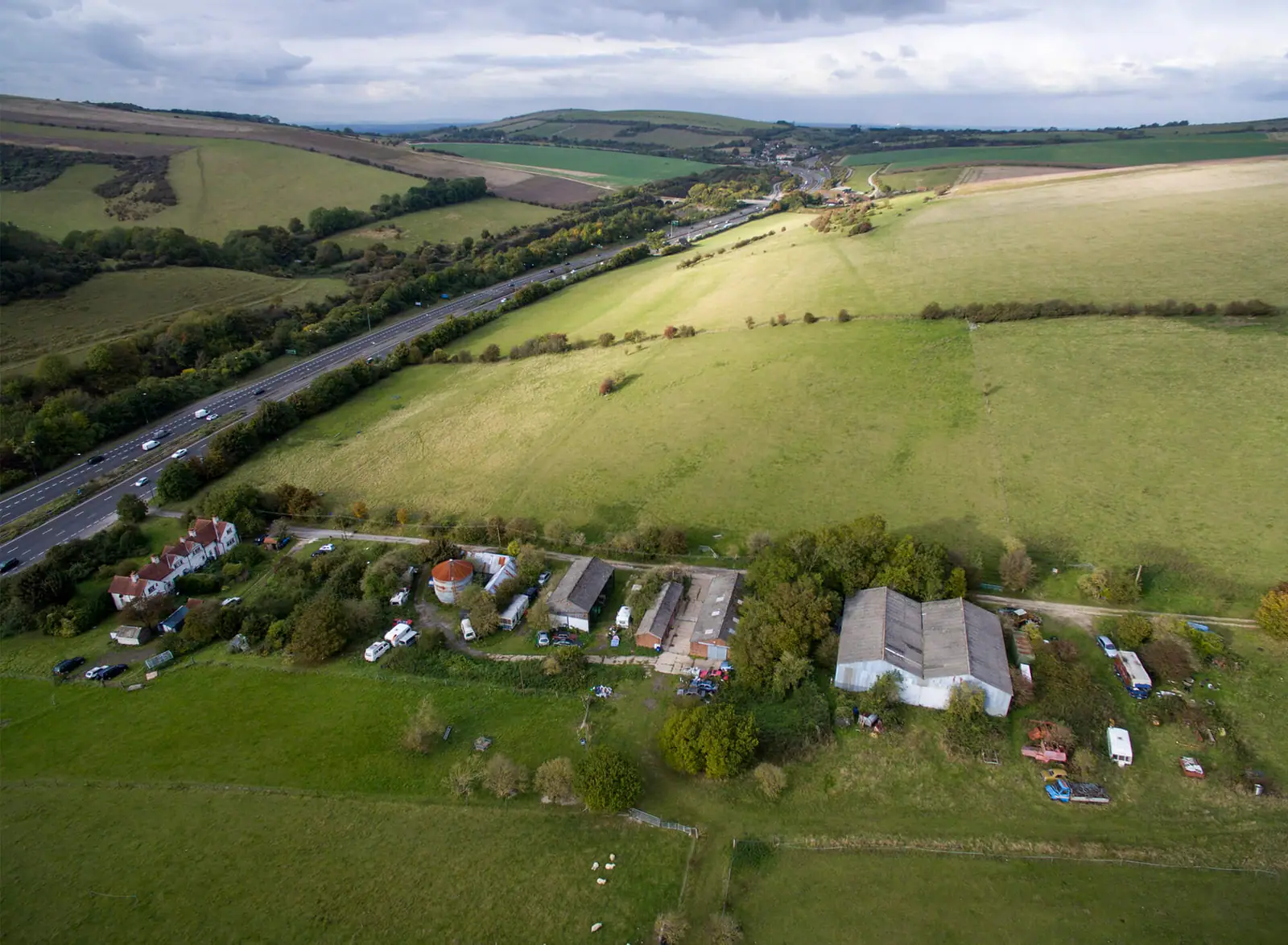 Wide aerial of the plots and farm buildings