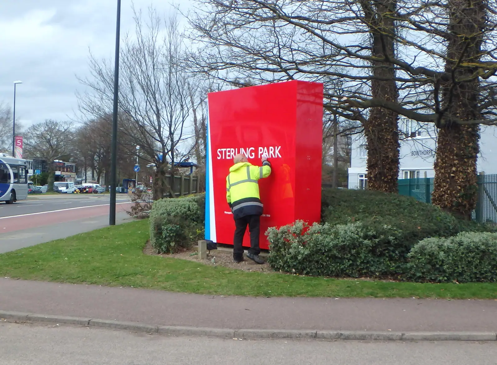Installer finishing the new Sterling Park sign