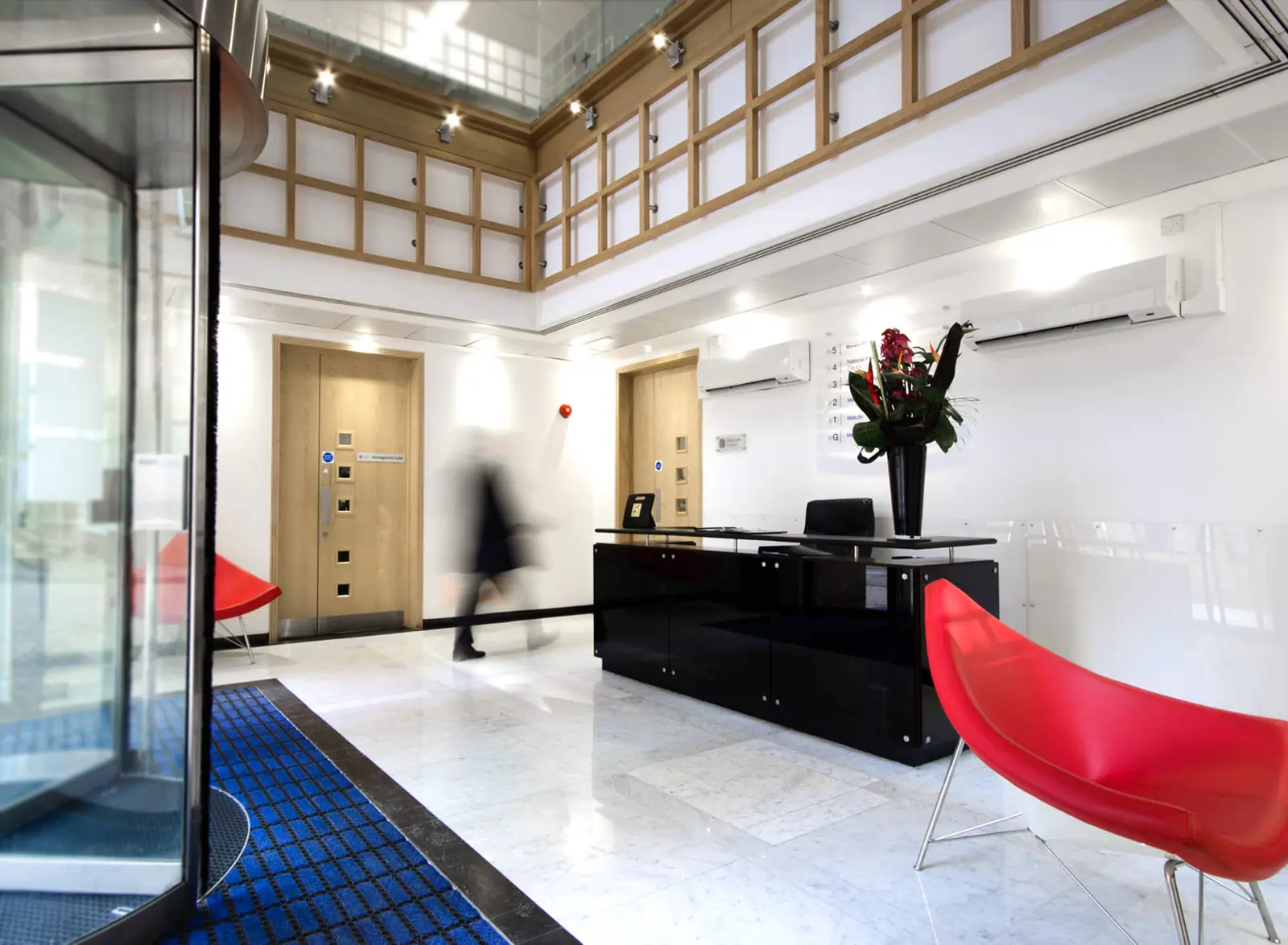Trafalgar House reception with a black desk