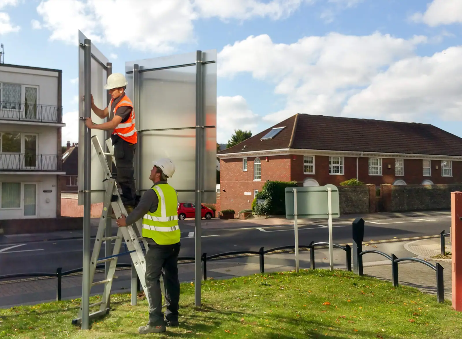 Installers fitting the marketing board