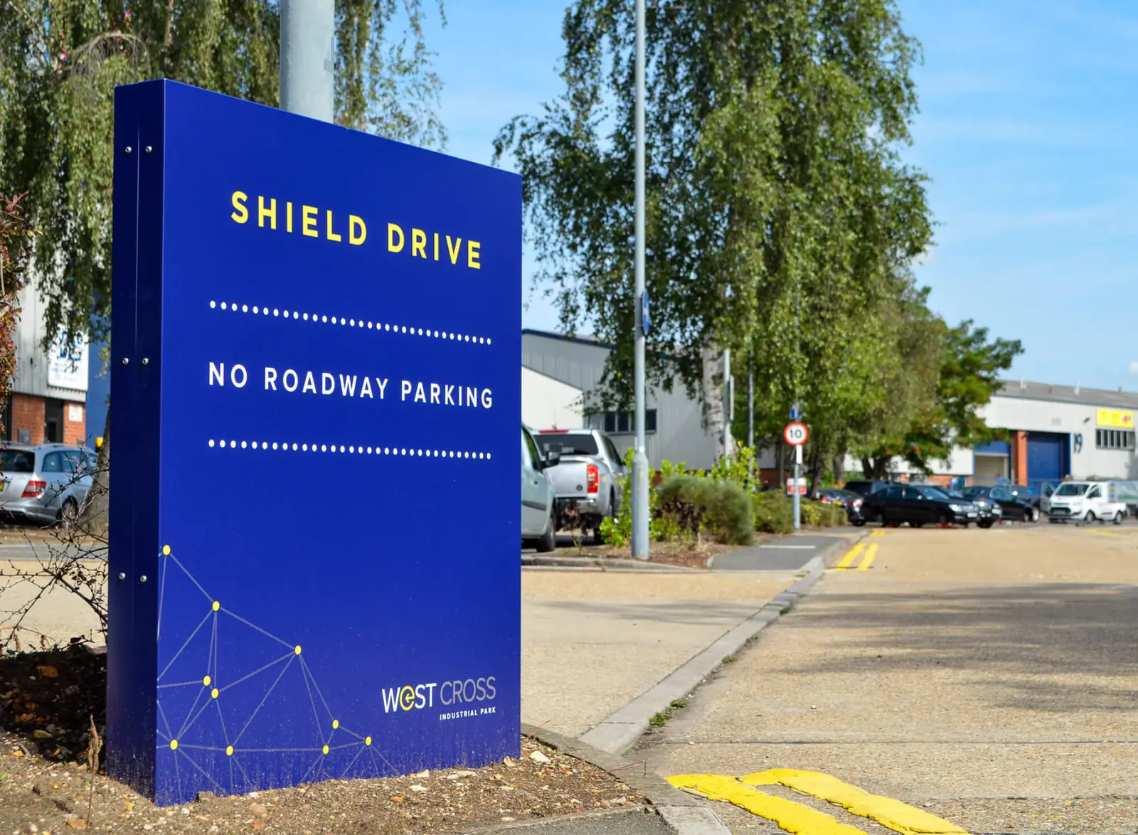 Shield Drive road sign in the West Cross style