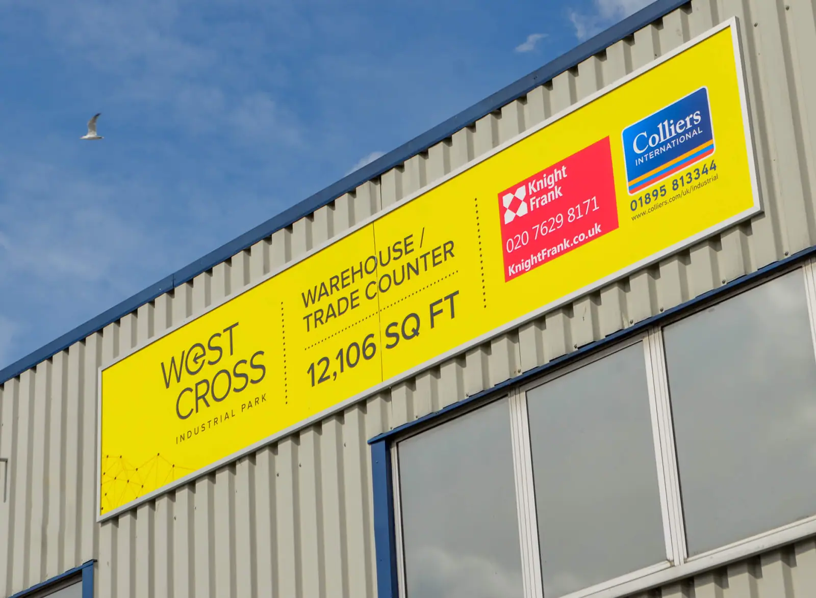 Yellow West Cross 'warehouse to let' fascia banner